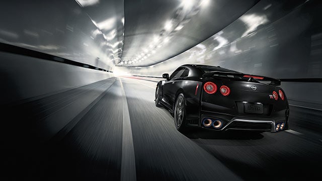2023 Nissan GT-R seen from behind driving through a tunnel | Carlock Nissan Of Tupelo in Tupelo MS